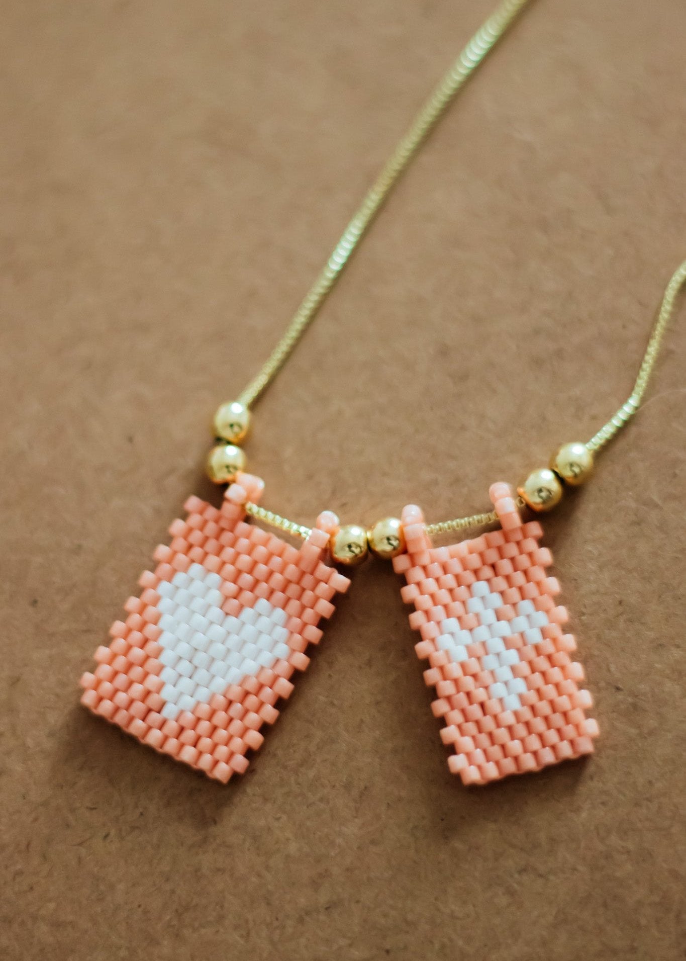 Salmon Crossed Heart Necklace